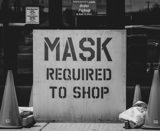 COVID-19 mask requirements meet capitalism's demands for profit. (cc) Roman K. (https://flic.kr/p/2ja7egX)